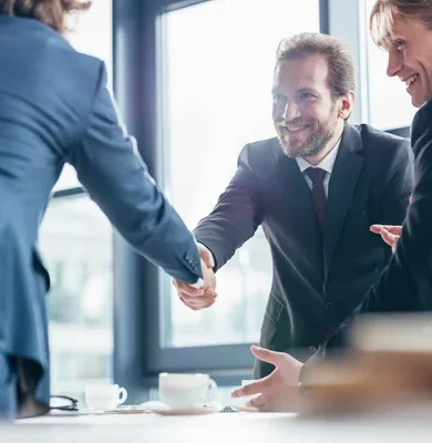 depositphotos_166639202-stock-photo-businessmen-shaking-hands